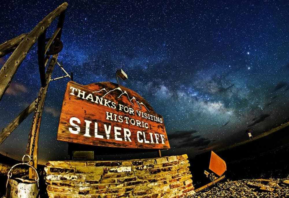 Town of silver cliff departure sign - "Thanks for visiting historic silver cliff" at night