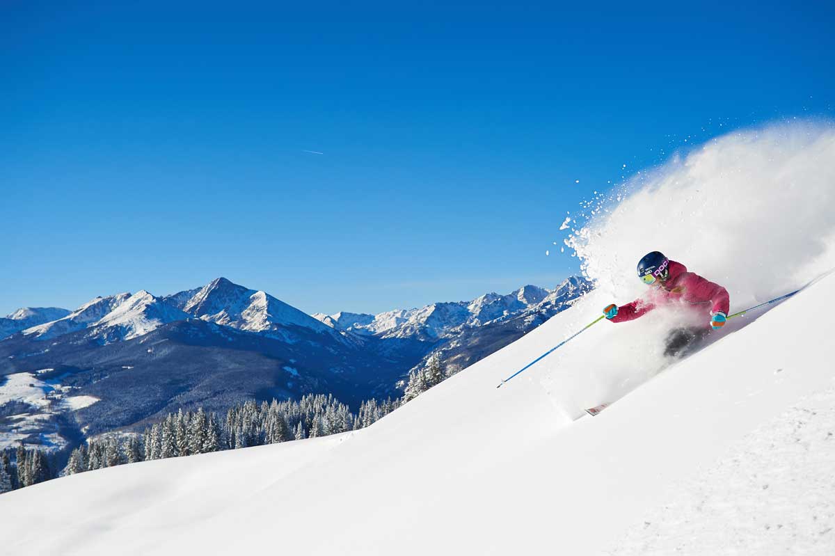 Solo skier on power at Vail Mountain