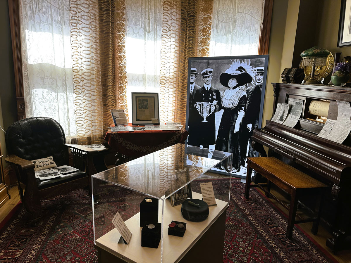 Artifacts, photographs and period furnishings inside the Molly Brown House Museum in Denver
