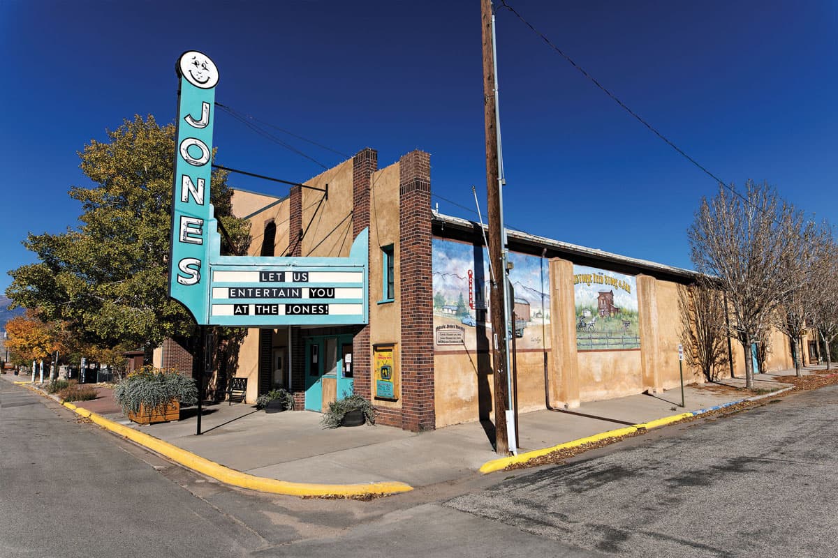 Outside of the Historic Jones Theater in Westcliffe, Colorado with blue sky in the background.