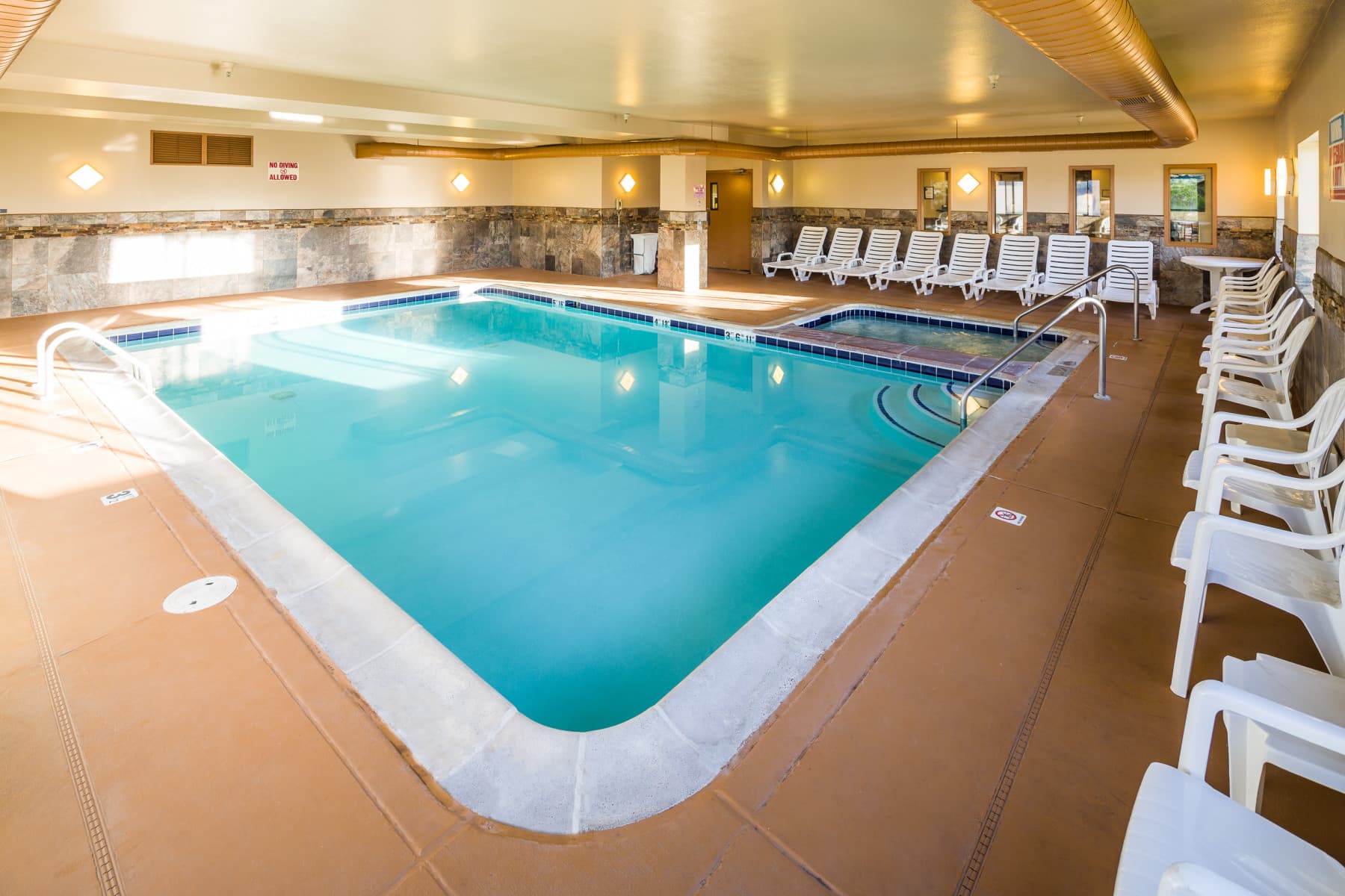 indoor heated pool and hot tub photo 8