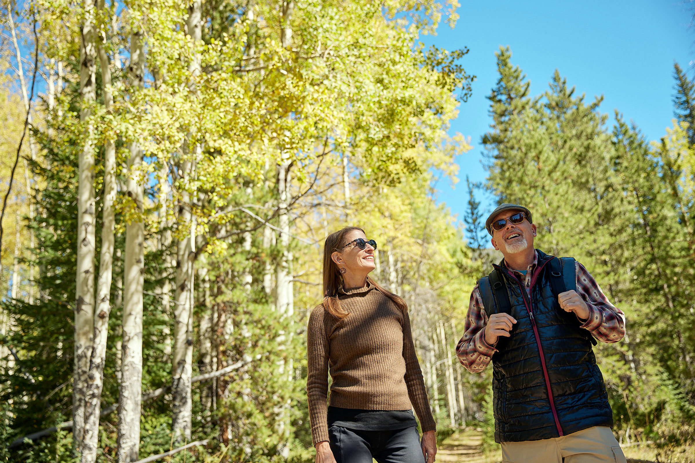 Couple hiking in the forest in Colorado