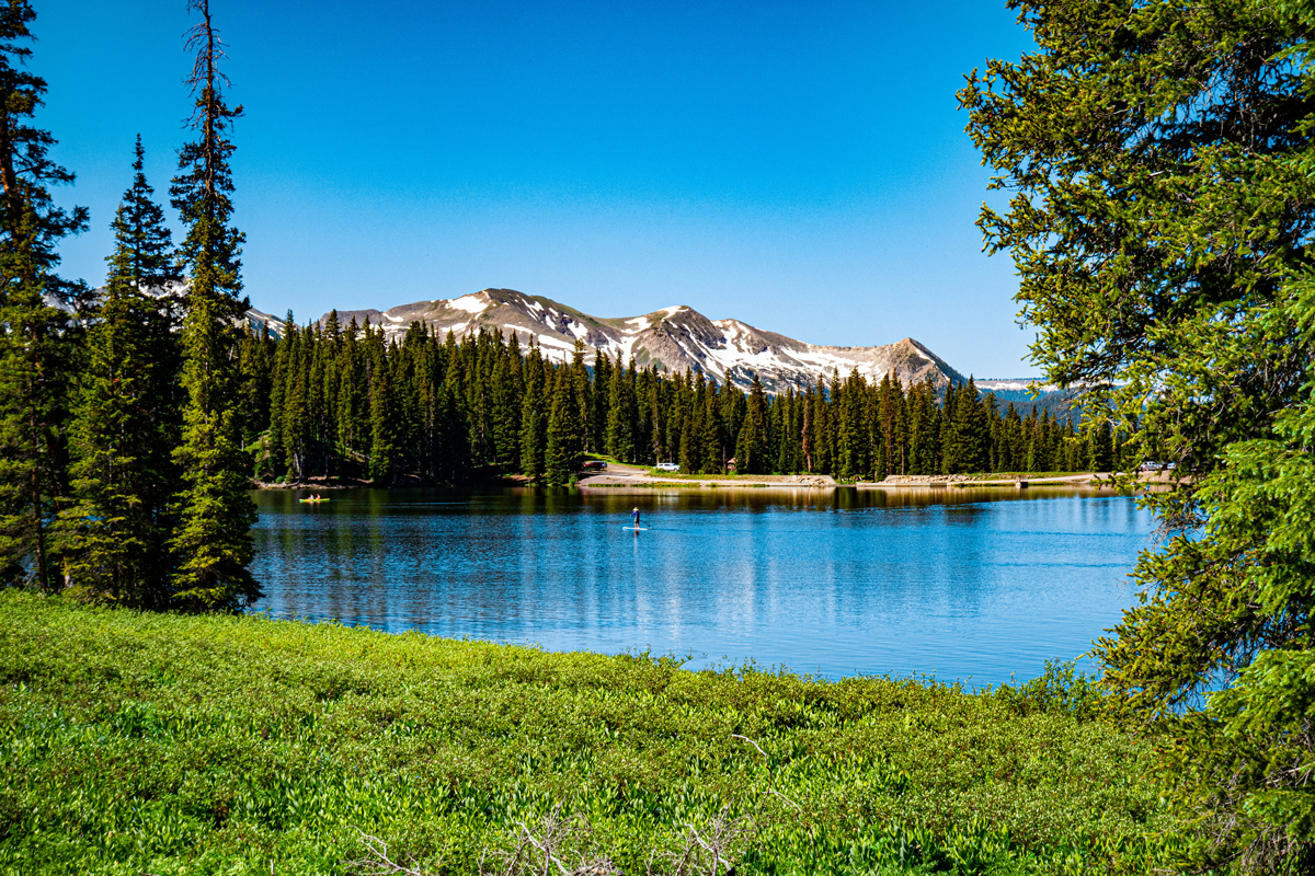 A person spends a peaceful day paddleboarding on one of Gunnison or Crested Butte’s many scenic lakes