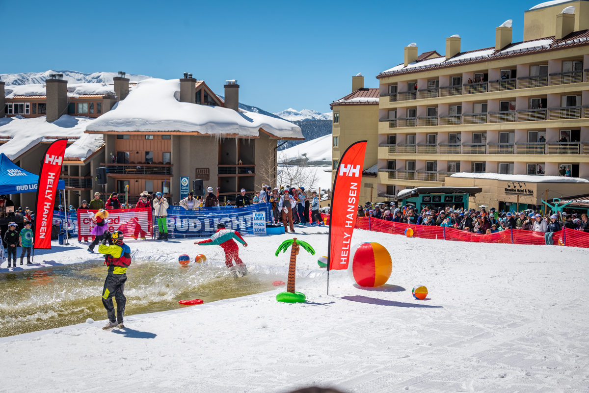 costumed daredevils attempt to ski across a man-made pond at the base area each spring during closing weekend at Crested Butte Mountain Resort.