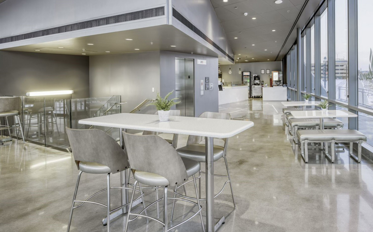 Silver tables and chairs at the Flame Café at the US Olympic & Paralympic Museum in Colorado Springs