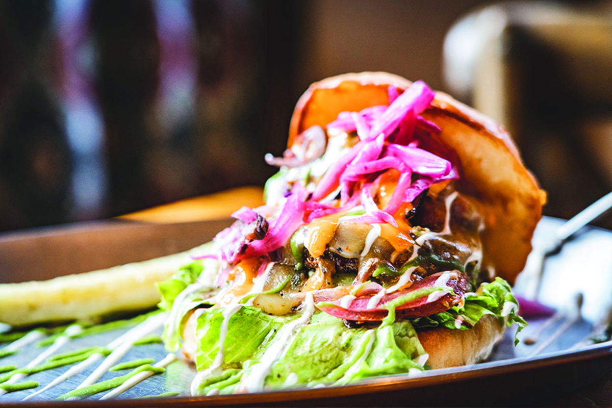 Stacked hamburger with various toppings from Murphy's Mountain Grill in Evergreen, Colorado.