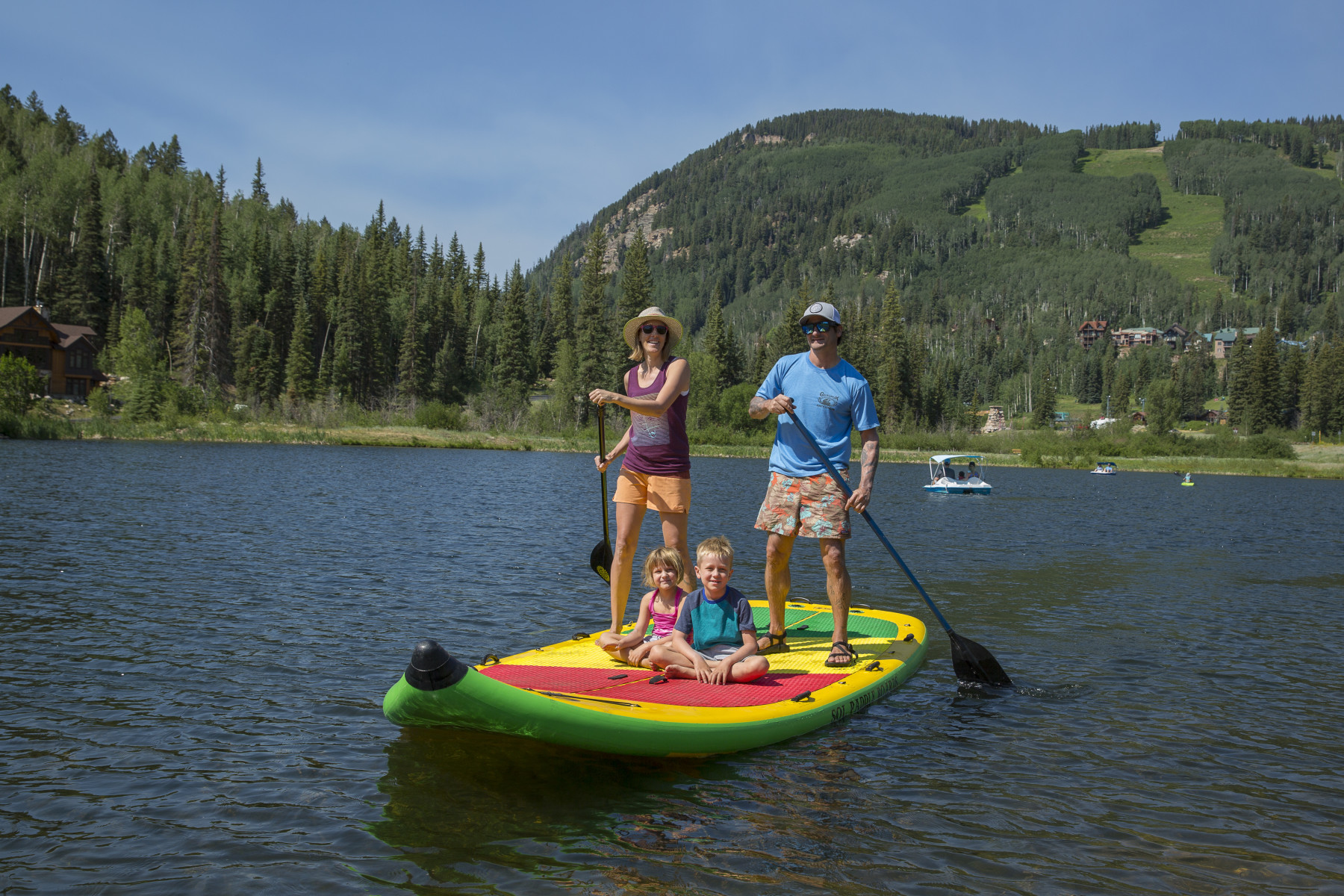 taking the stand up paddleboard out on twilight lake, one of the activities included in the total adventure ticket. photo 4